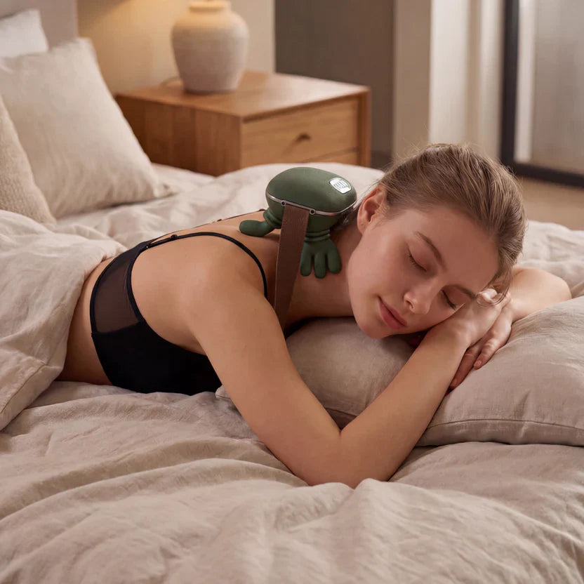 BioniQ Heat Pro neck massager in use — stress and tension relief for desk workers